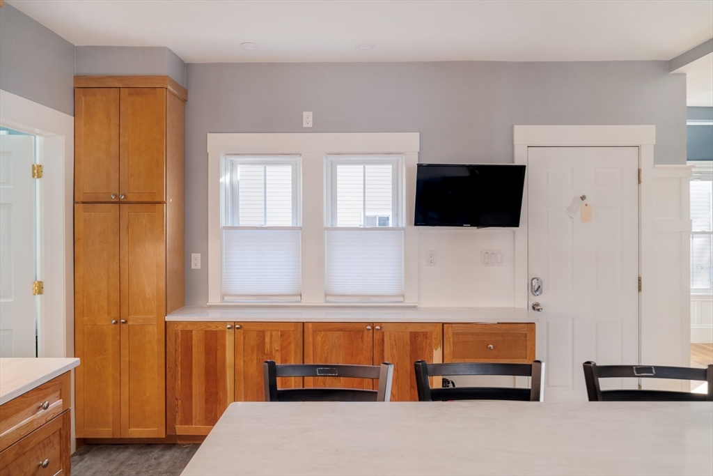 21 Berkeley Street Somerville, MA 02143 - Photo 6 of 36 a living room with furniture