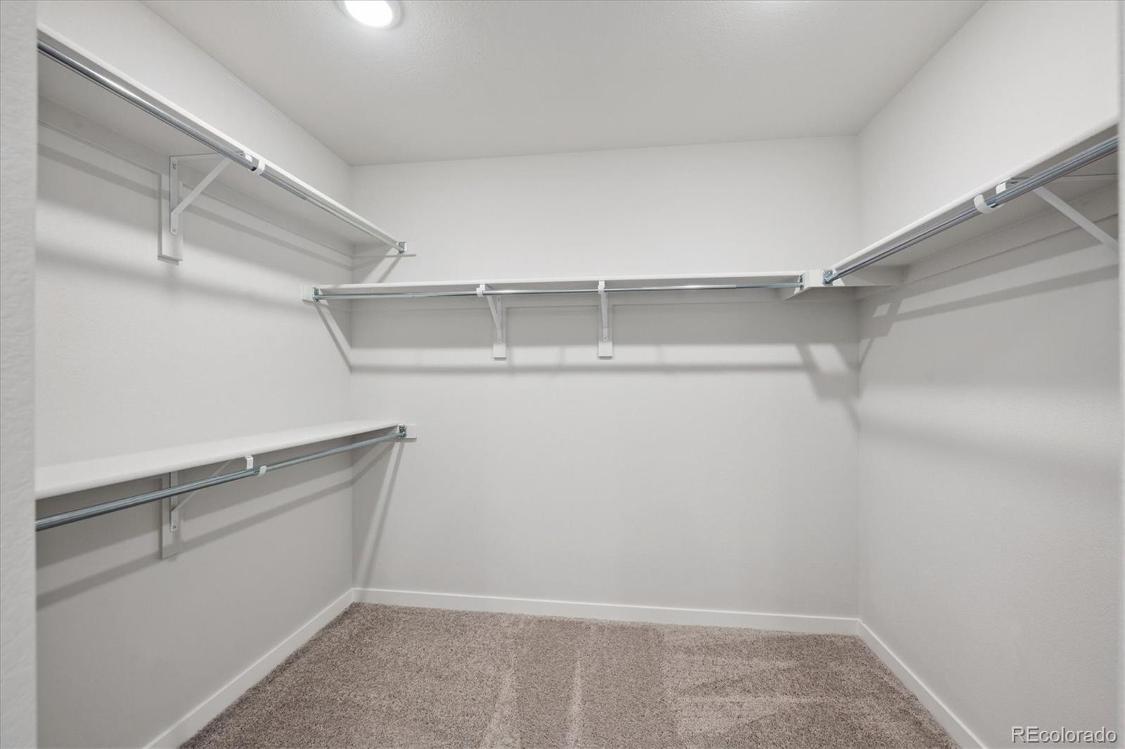 14434 Ranch Street Mead, CO 80504 - Photo 26 of 27 a view of an empty walk in closet