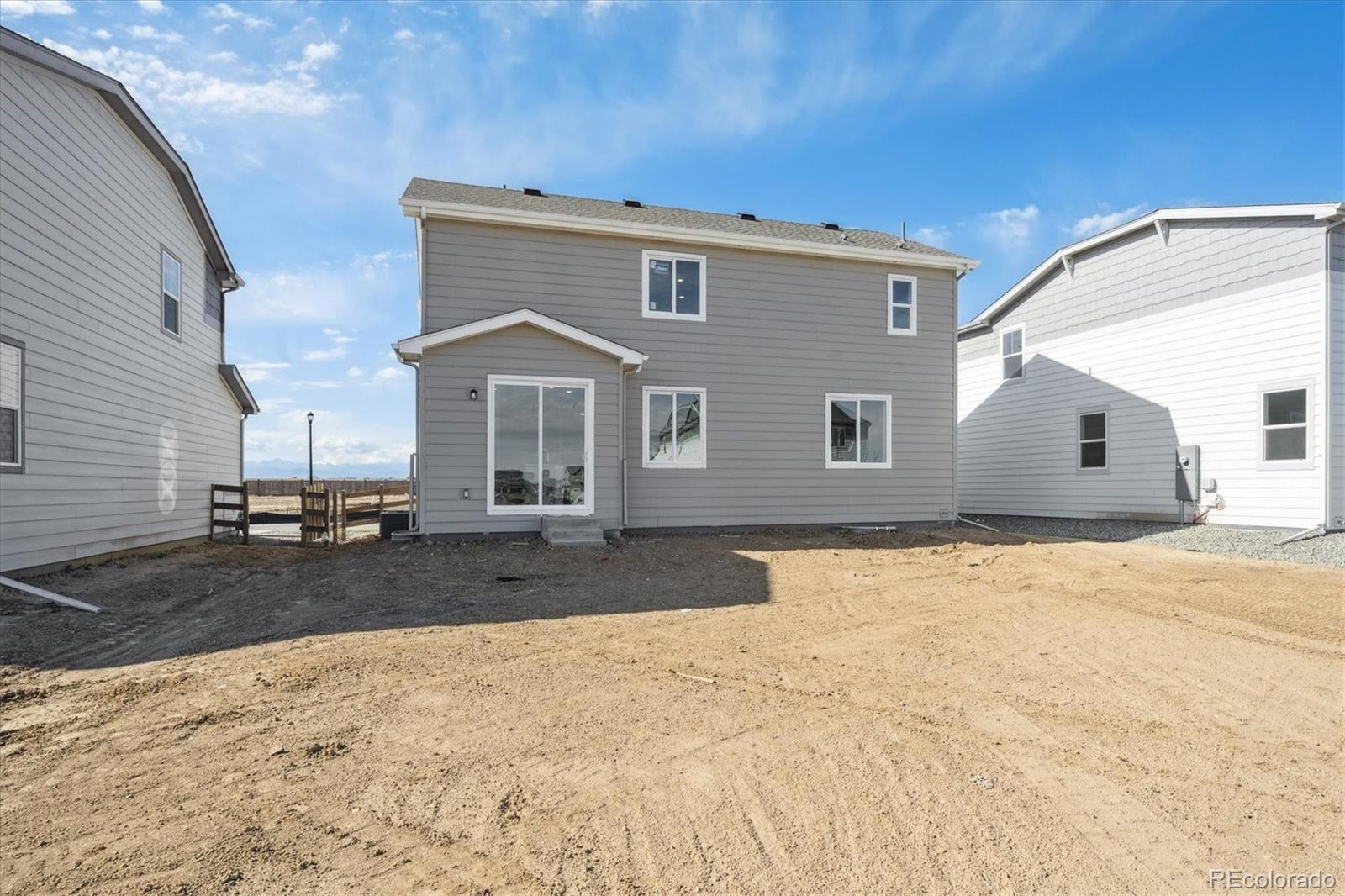 14434 Ranch Street Mead, CO 80504 - Photo 27 of 27 a view of a house with a snow in the yard