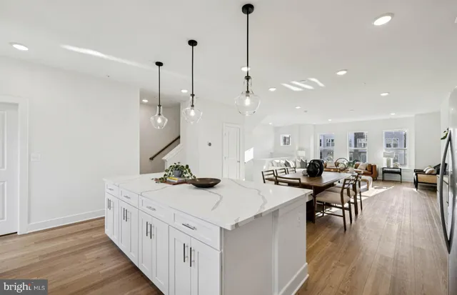 a group of people walking down a street