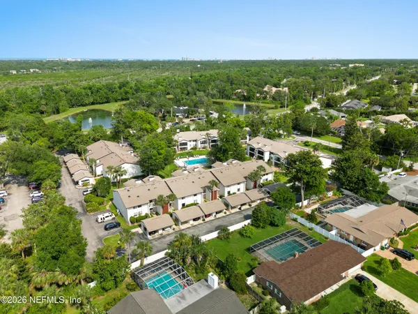 a view of a house with a big yard