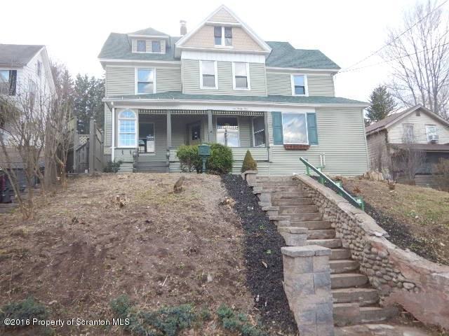 234 Ridge Street Honesdale, PA 18431 - Photo 1 of 20 a front view of a house with a yard