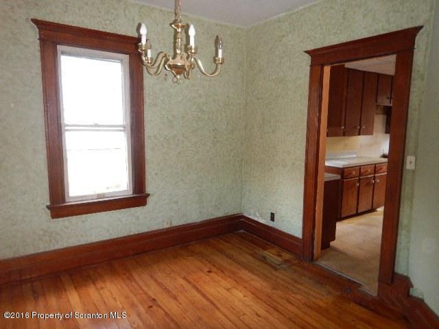 234 Ridge Street Honesdale, PA 18431 - Photo 13 of 20 a view of empty room with wooden floor and fan