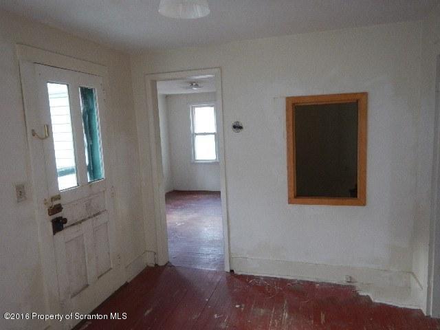 234 Ridge Street Honesdale, PA 18431 - Photo 16 of 20 an empty room with wooden floor and windows