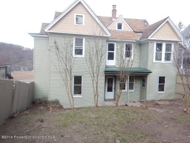 234 Ridge Street Honesdale, PA 18431 - Photo 6 of 20 a front view of a house with a yard