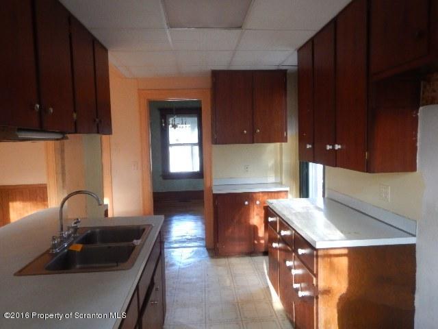 234 Ridge Street Honesdale, PA 18431 - Photo 8 of 20 a kitchen with a sink and a stove top oven