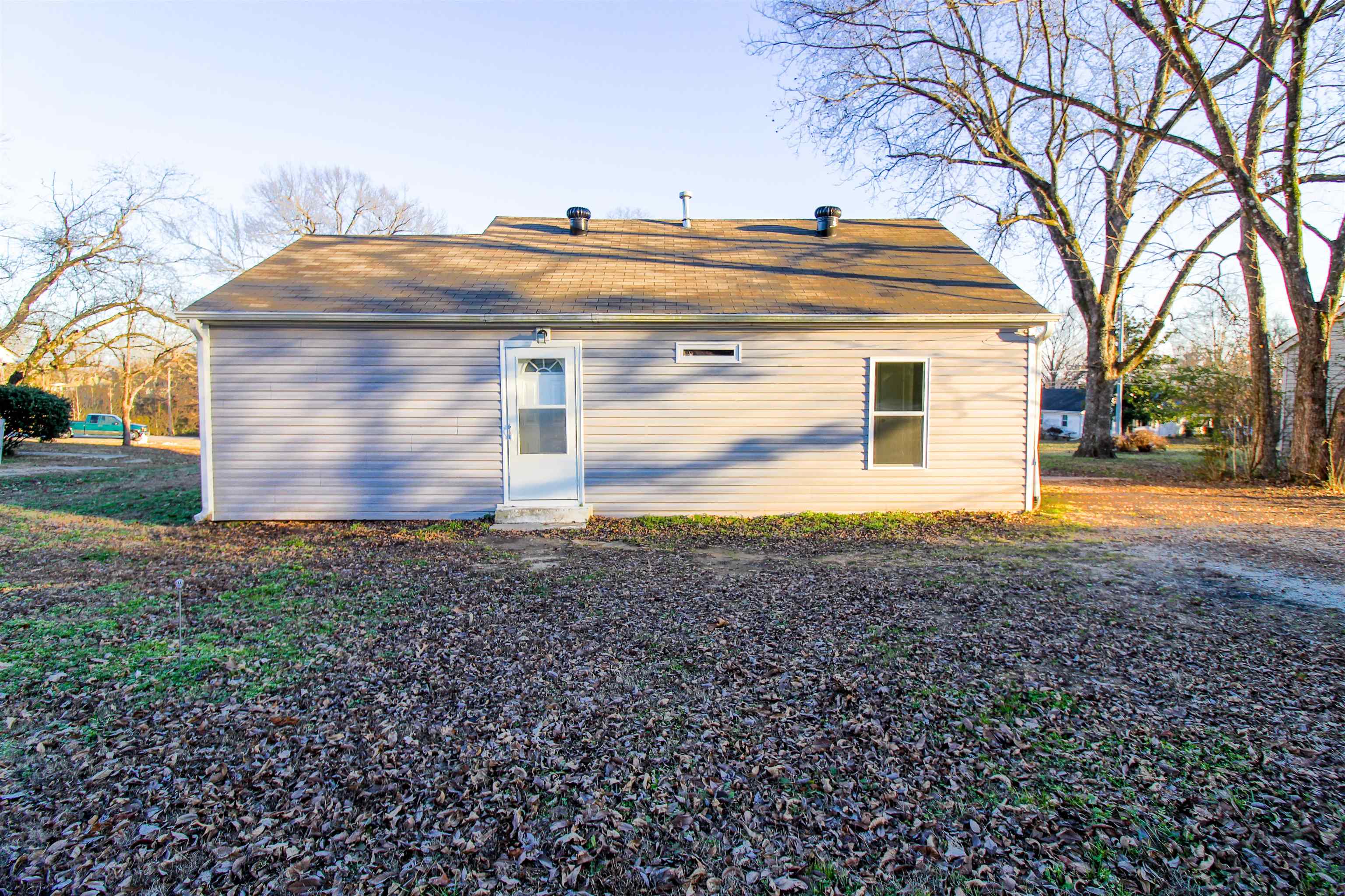 284 Highland Street Ripley, TN 38063 - Photo 21 of 23 a front view of house with yard