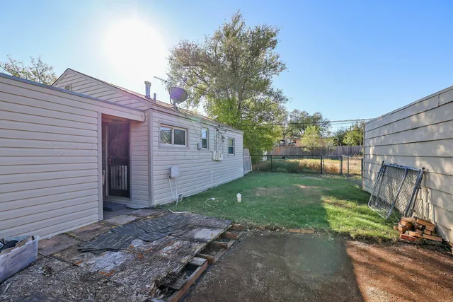 a view of a backyard with a garden