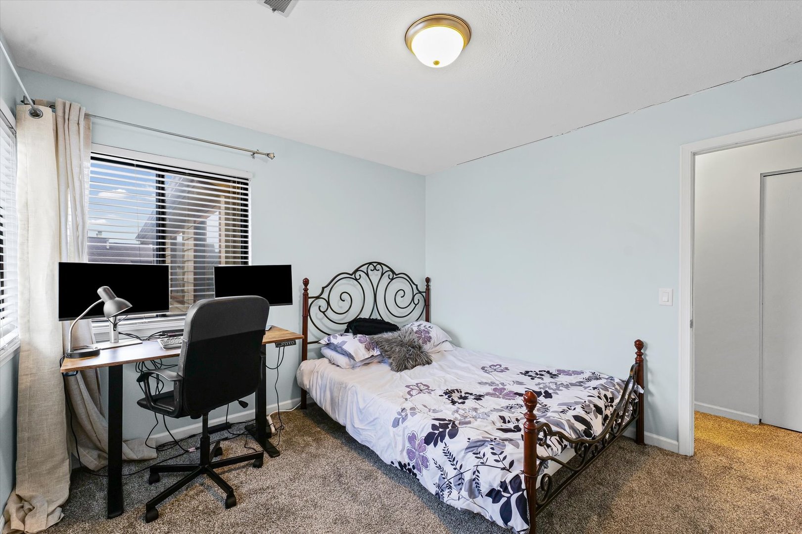 2159 Harbor Town Circle, Unit 2159 Champaign, IL 61821 - Photo 17 of 22 a bedroom with a bed chair and a desk