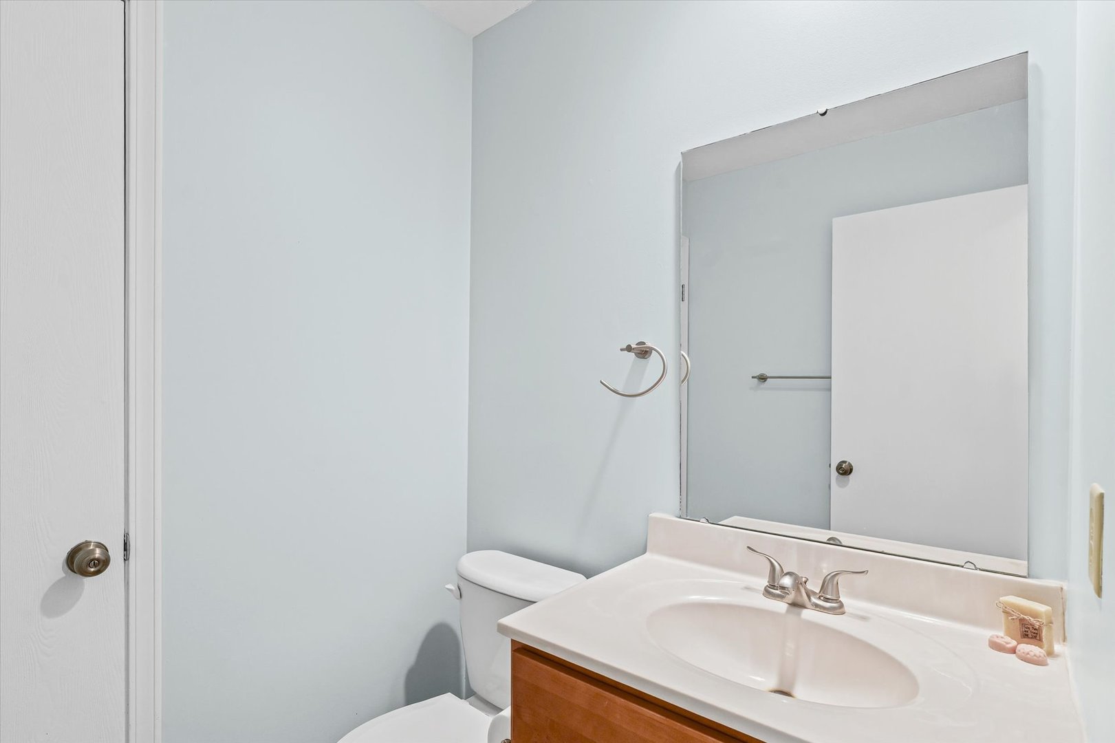 2159 Harbor Town Circle, Unit 2159 Champaign, IL 61821 - Photo 18 of 22 a bathroom with a sink toilet and vanity