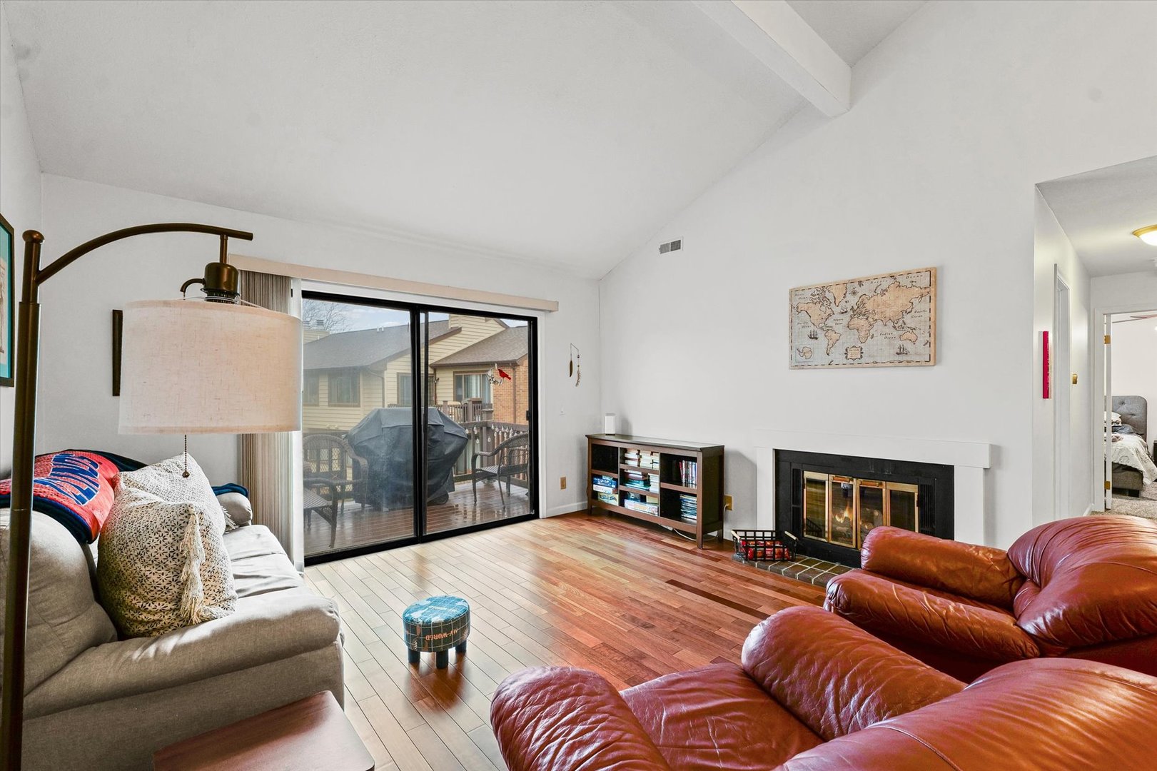 2159 Harbor Town Circle, Unit 2159 Champaign, IL 61821 - Photo 5 of 22 a living room with furniture and a fireplace