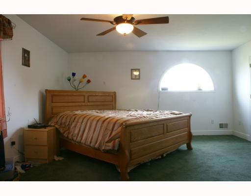 125 Leon Road Green Tree, PA 15220 - Photo 12 of 18 Master Bedroom. Master bedroom with dark green carpeting, huge walk-in closet, and master bath.