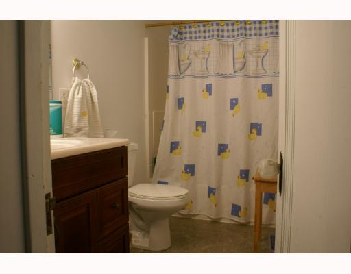 125 Leon Road Green Tree, PA 15220 - Photo 17 of 18 Other. Hall Bath: vanity sink, white tub and toilet, beige floor, white walls.