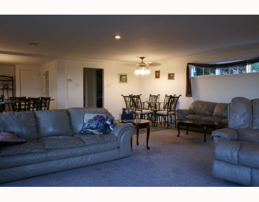 125 Leon Road Green Tree, PA 15220 - Photo 5 of 18 Den/Family/Great Room. Family Room/Dining Room. Looking from doors to deck towards dining area.