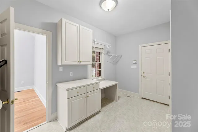 a kitchen with stainless steel appliances granite countertop a stove and a sink
