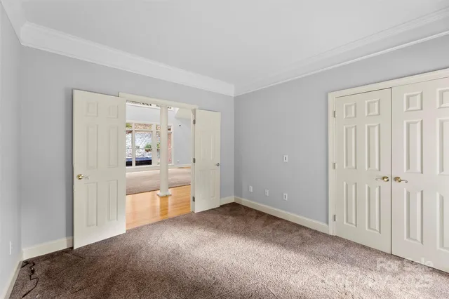 a bathroom with a sink vanity granite and a mirror