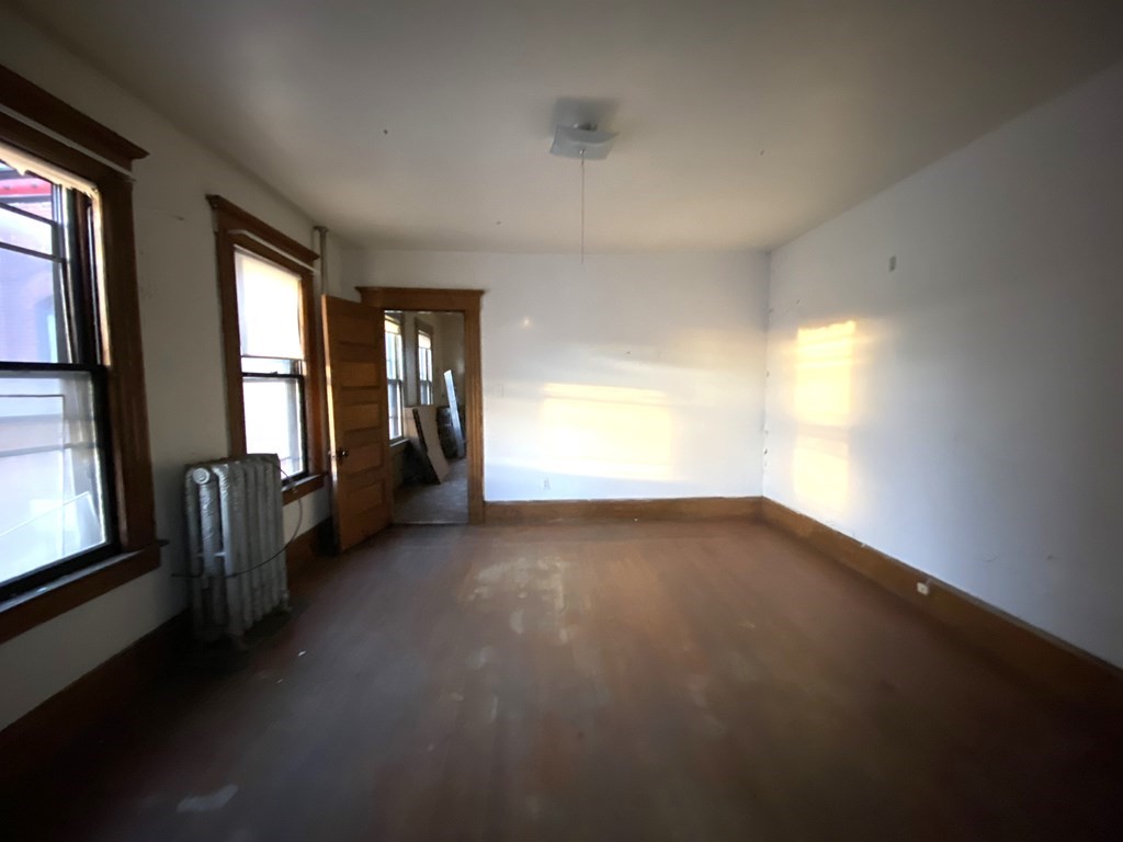 2-4 Johnson Street Springfield, MA 01108 - Photo 7 of 9 an empty room with windows