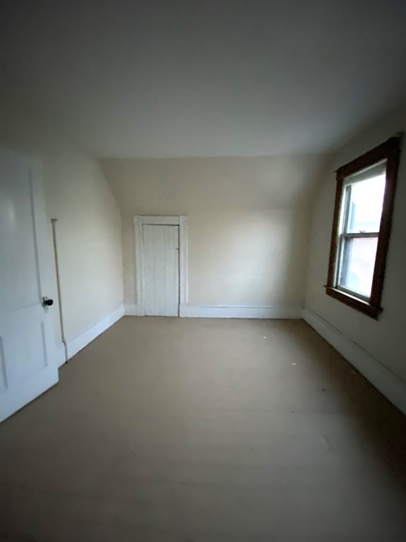 2-4 Johnson Street Springfield, MA 01108 - Photo 8 of 9 an empty room with a window