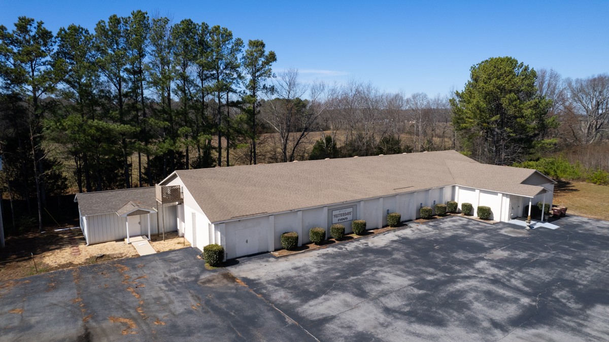 15631 Brownsferry Road Athens, AL 35611 - Photo 1 of 38 a view of a house with a yard and large tree