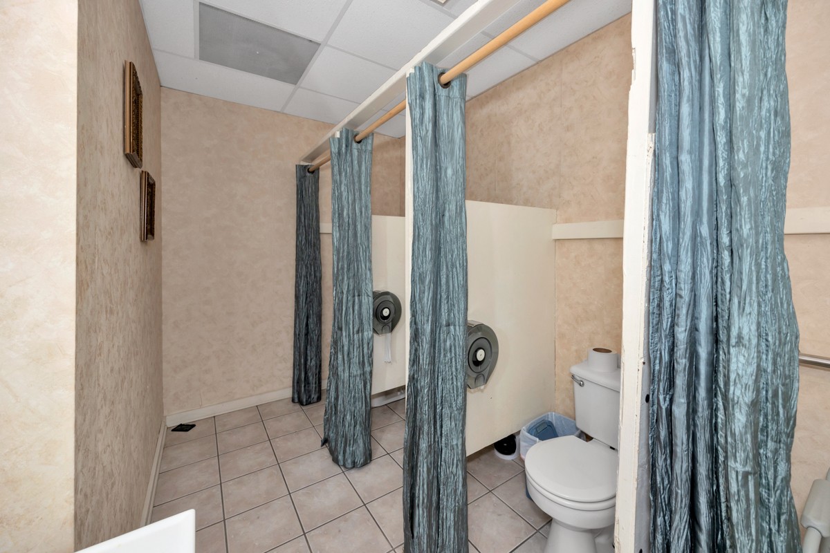 15631 Brownsferry Road Athens, AL 35611 - Photo 15 of 38 a bathroom with a glass door shower