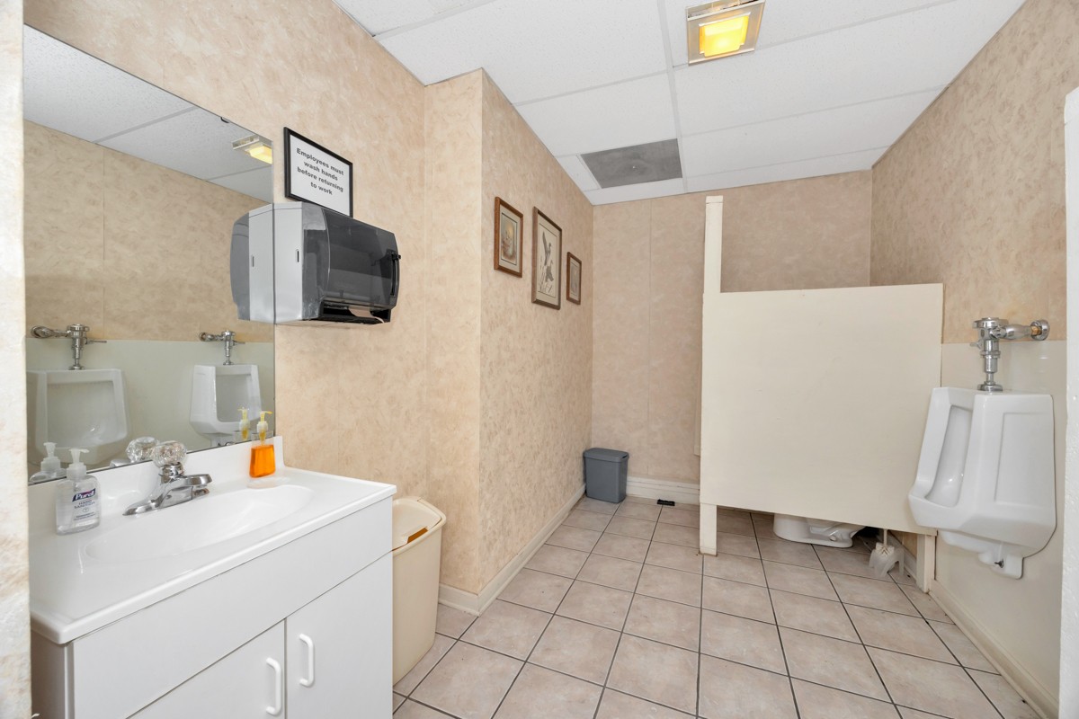 15631 Brownsferry Road Athens, AL 35611 - Photo 16 of 38 a bathroom with a sink toilet and tub