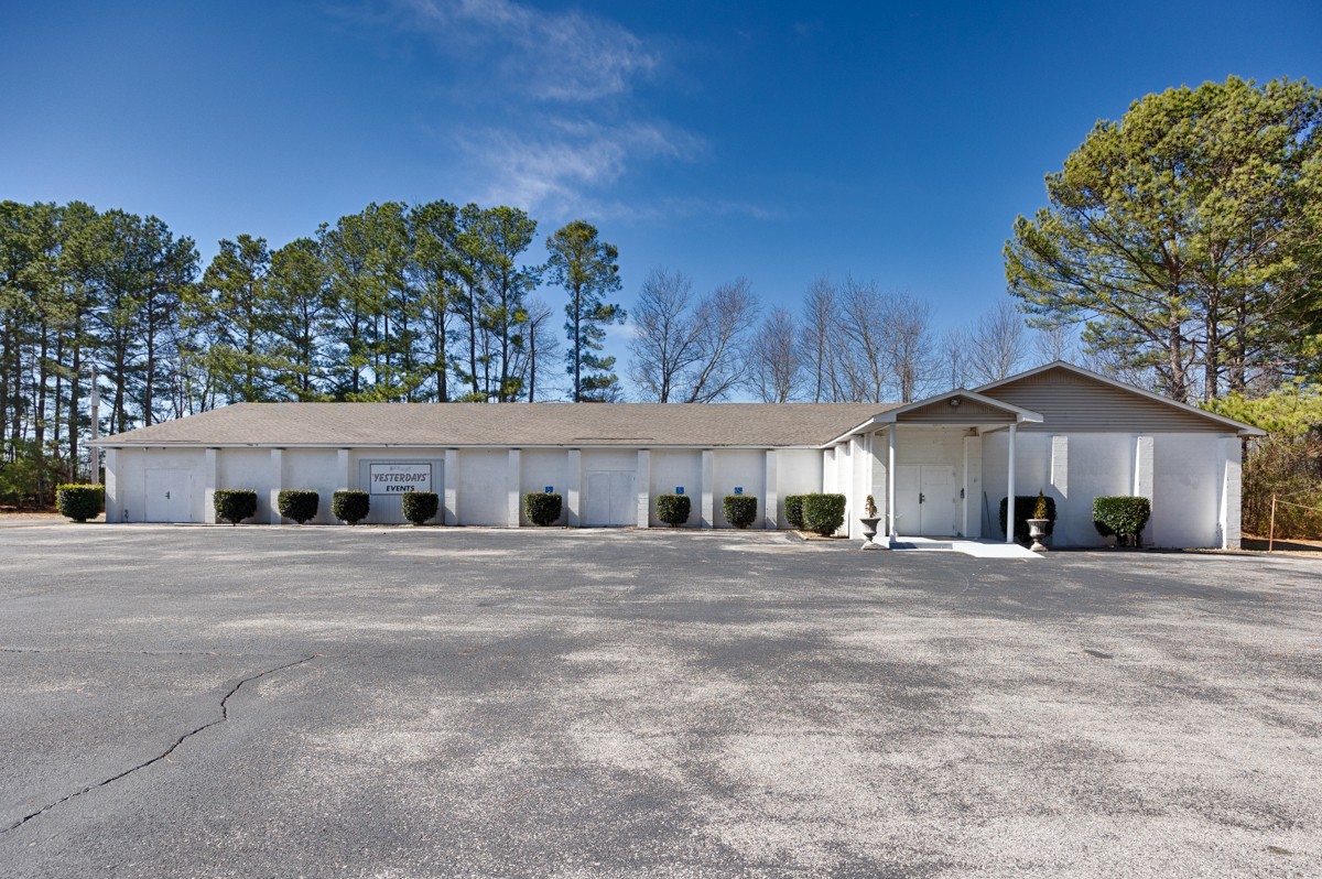15631 Brownsferry Road Athens, AL 35611 - Photo 9 of 38 a front view of a house with a yard and garage