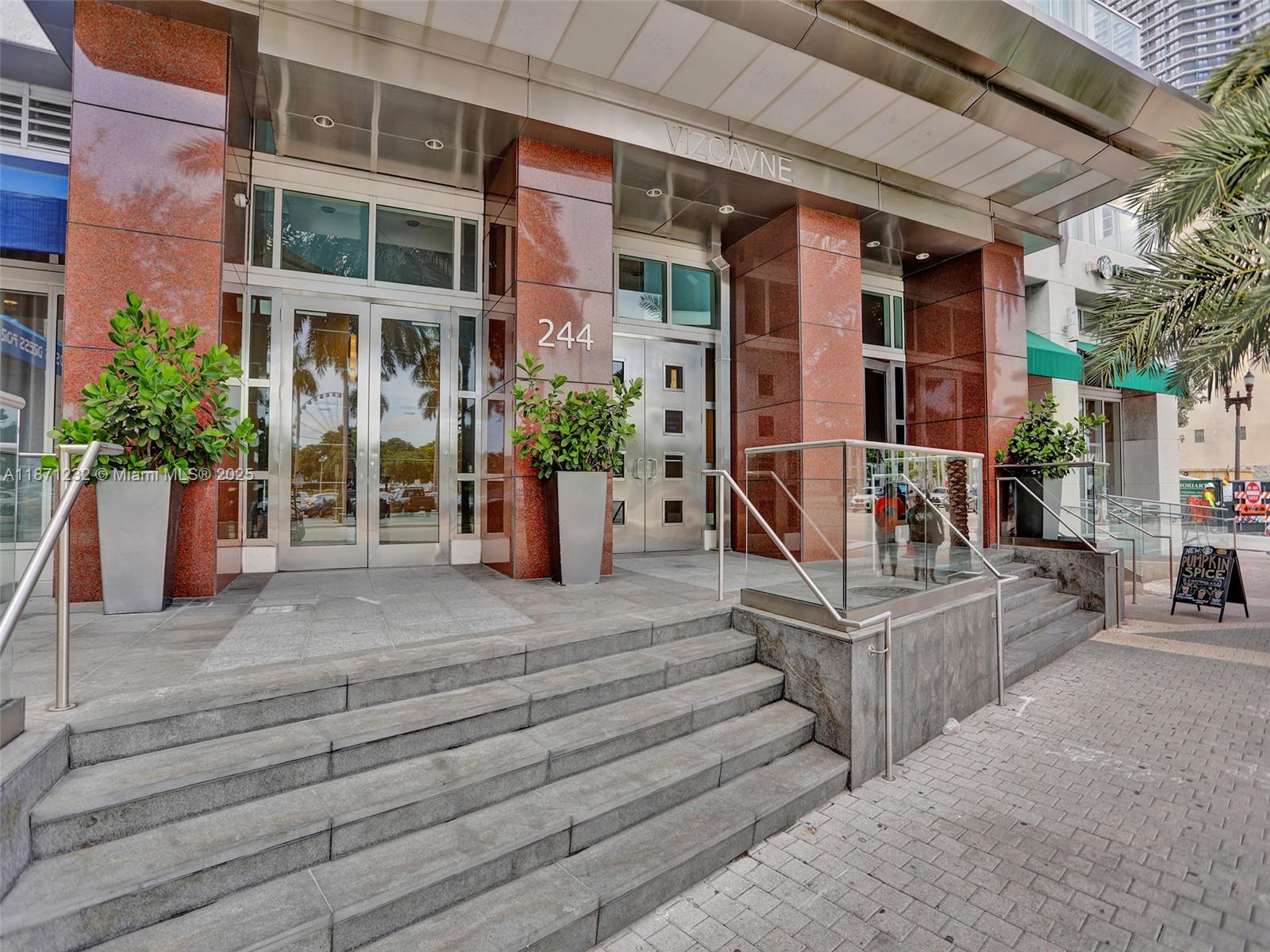 244 Biscayne Boulevard, Unit 406 Miami, FL 33132 - Photo 2 of 28 a view of building with entrance