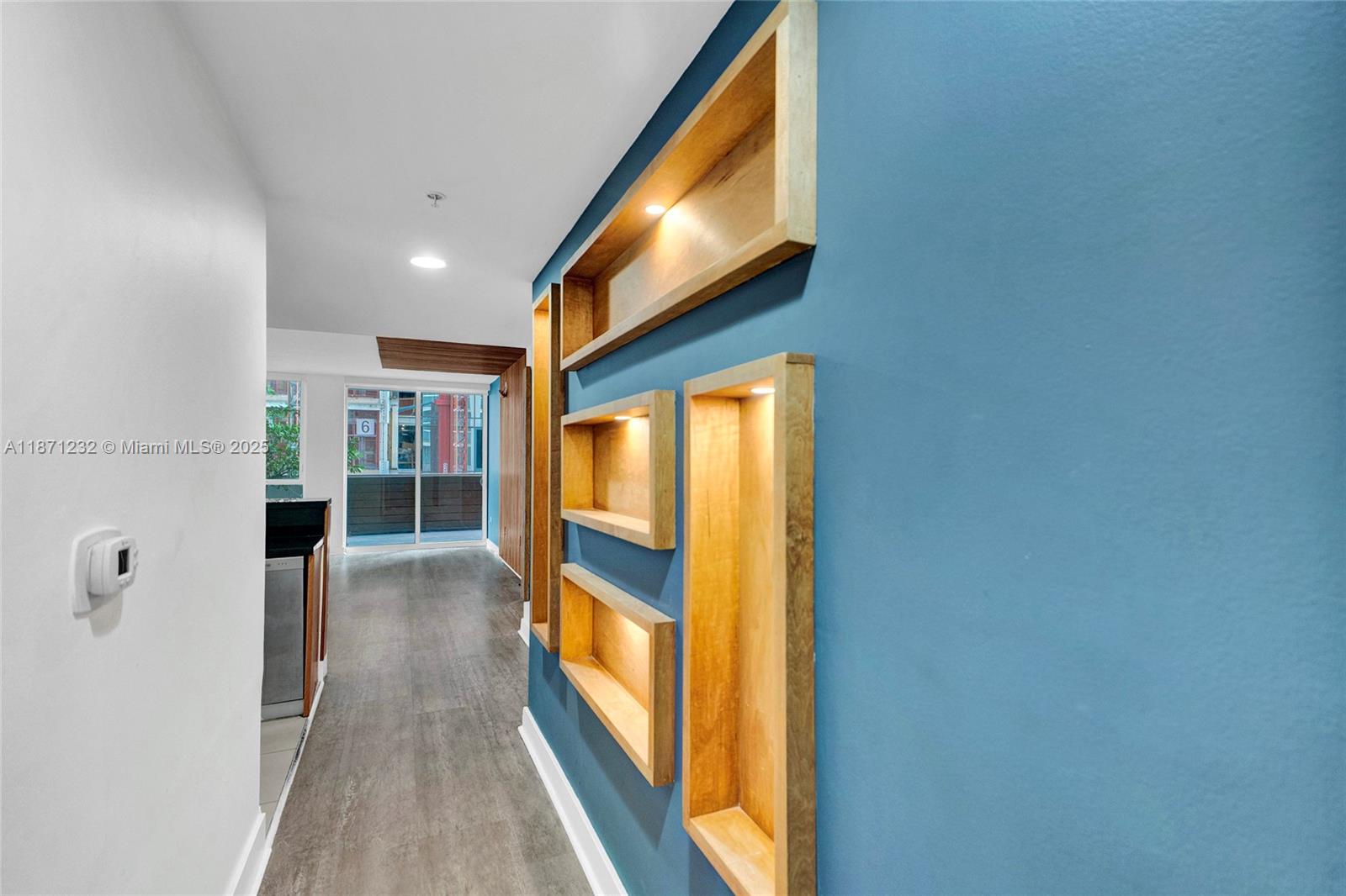 244 Biscayne Boulevard, Unit 406 Miami, FL 33132 - Photo 4 of 28 a view of hallway with livingroom