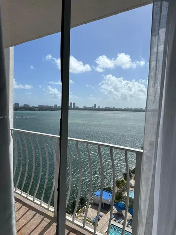 a view of a balcony with lake view