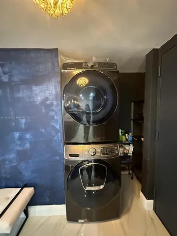 a stove top oven sitting inside of a kitchen