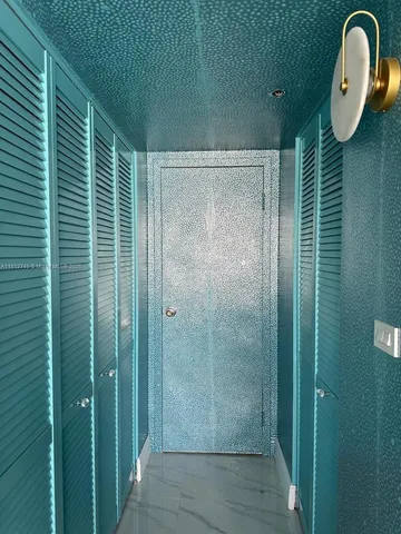 a view of a bathroom with a shower