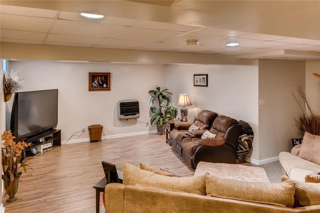 114 Oakland Heights Road Monaca, PA 15061 - Photo 24 of 25 Huge Family room leads to the Guest Suite and additional rooms and storage