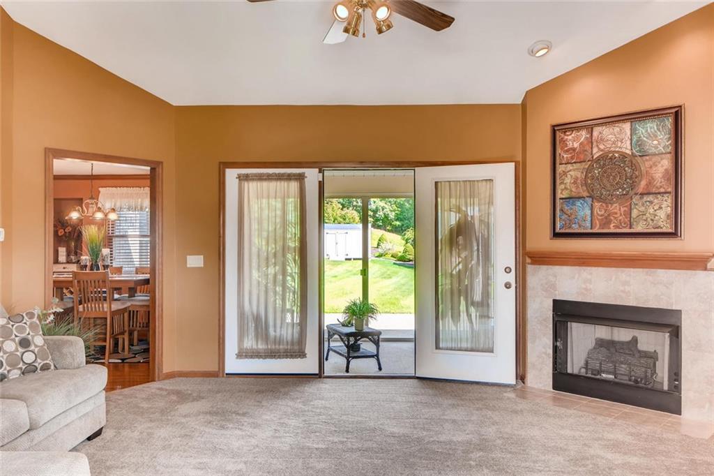 114 Oakland Heights Road Monaca, PA 15061 - Photo 10 of 25 Living room w/Gas Fireplace to Sun room