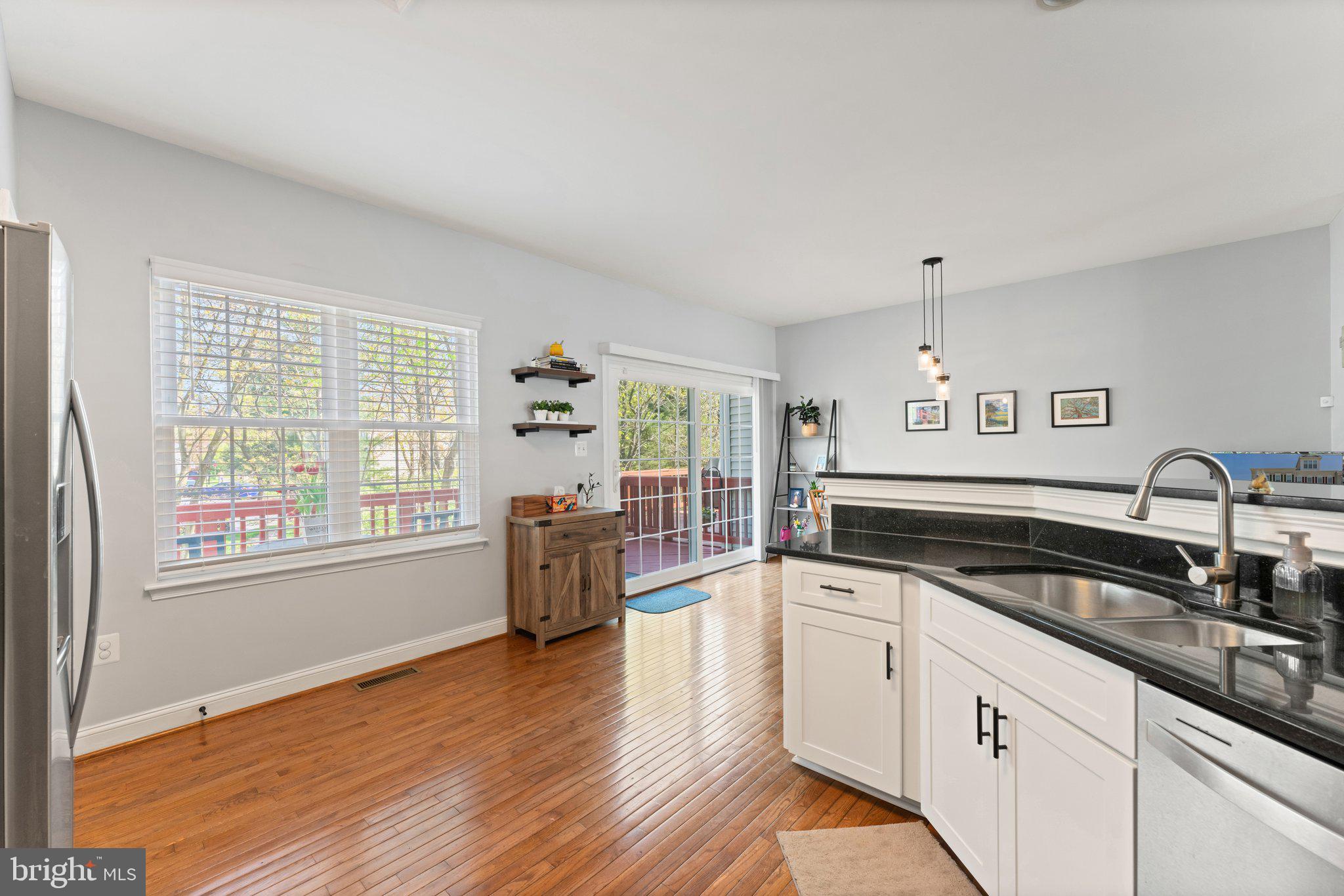 2068 Capstone Circle Herndon, VA 20170 - Photo 6 of 29 Kitchen w/Eat-In Breakfast Area By Windows