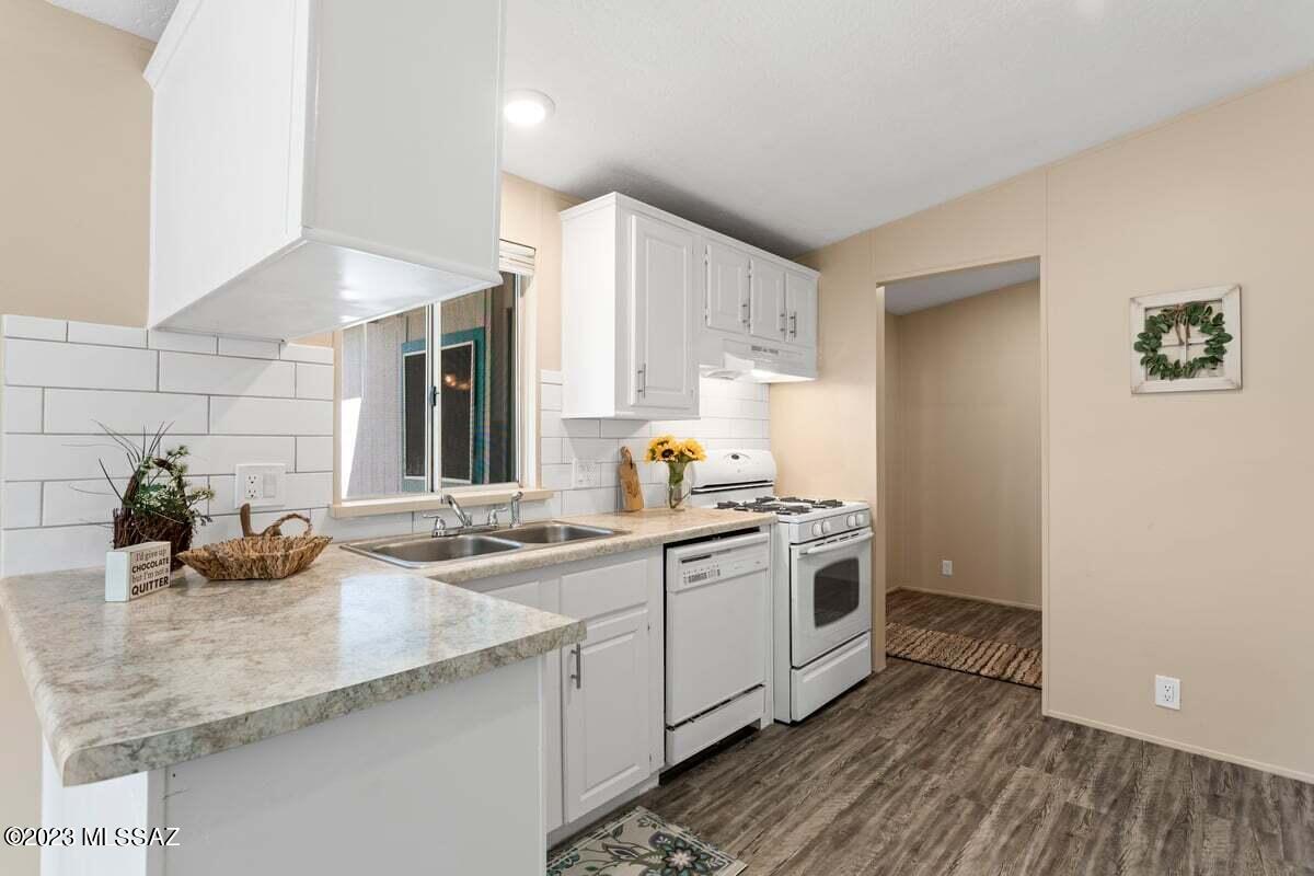 7725 North Van Ark Road Tucson, AZ 85743 - Photo 3 of 25 VA kitchen to laundry