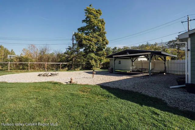 a front view of a house with yard