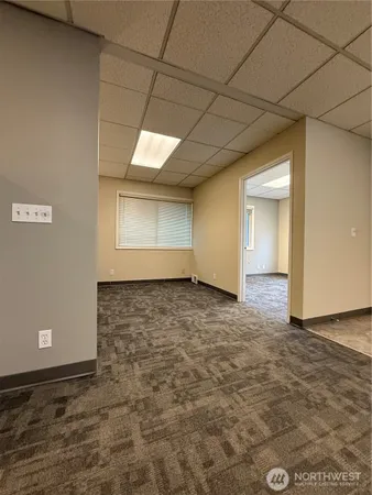 a view of an empty room and window