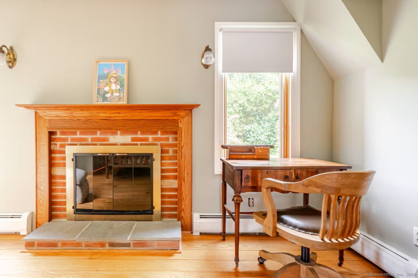 31 Cedar Hill Road New Milford, CT 06755 - Photo 23 of 40 a living room with a fireplace and a table