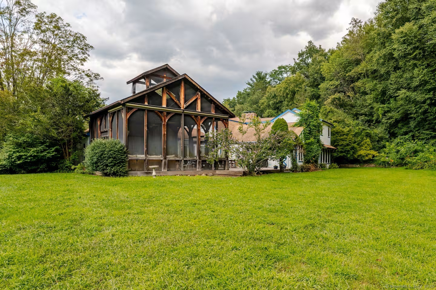 31 Cedar Hill Road New Milford, CT 06755 - Photo 35 of 40 a front view of a house with garden