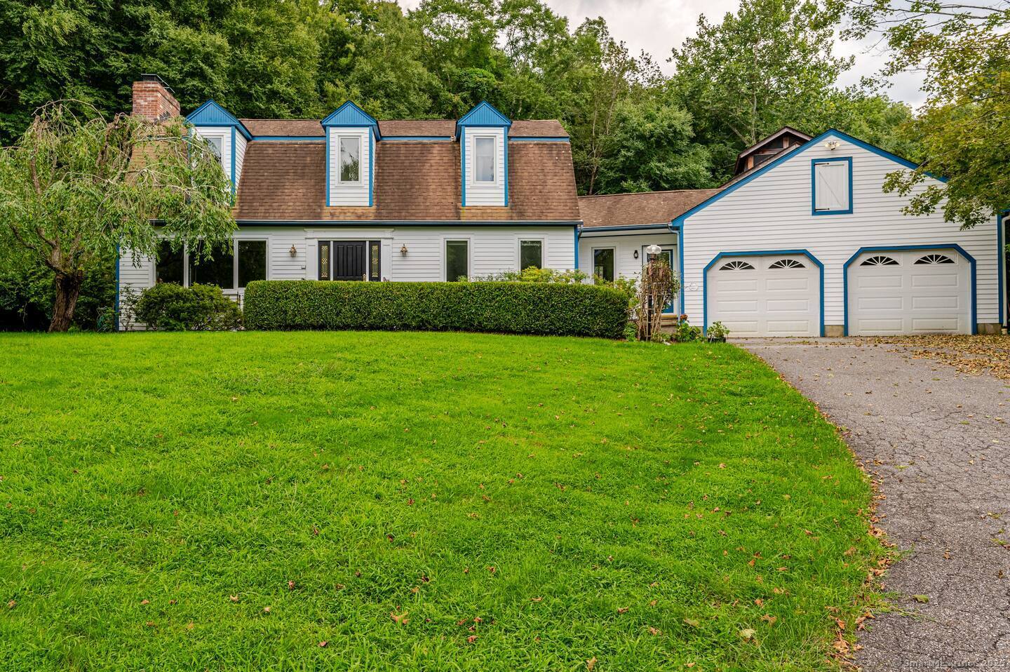 31 Cedar Hill Road New Milford, CT 06755 - Photo 40 of 40 a front view of a house with a yard