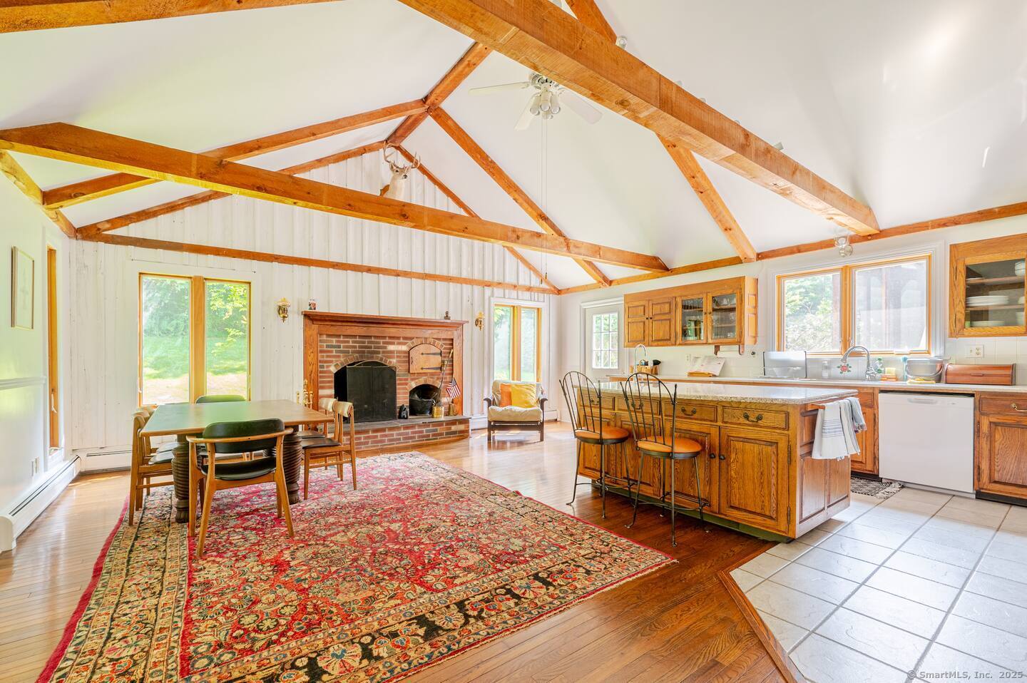 31 Cedar Hill Road New Milford, CT 06755 - Photo 6 of 40 a living room with furniture and a fireplace