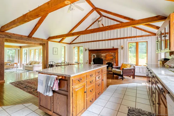 a very nice looking dining room with a large window