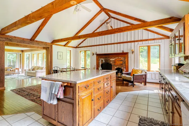 a very nice looking dining room with a large window