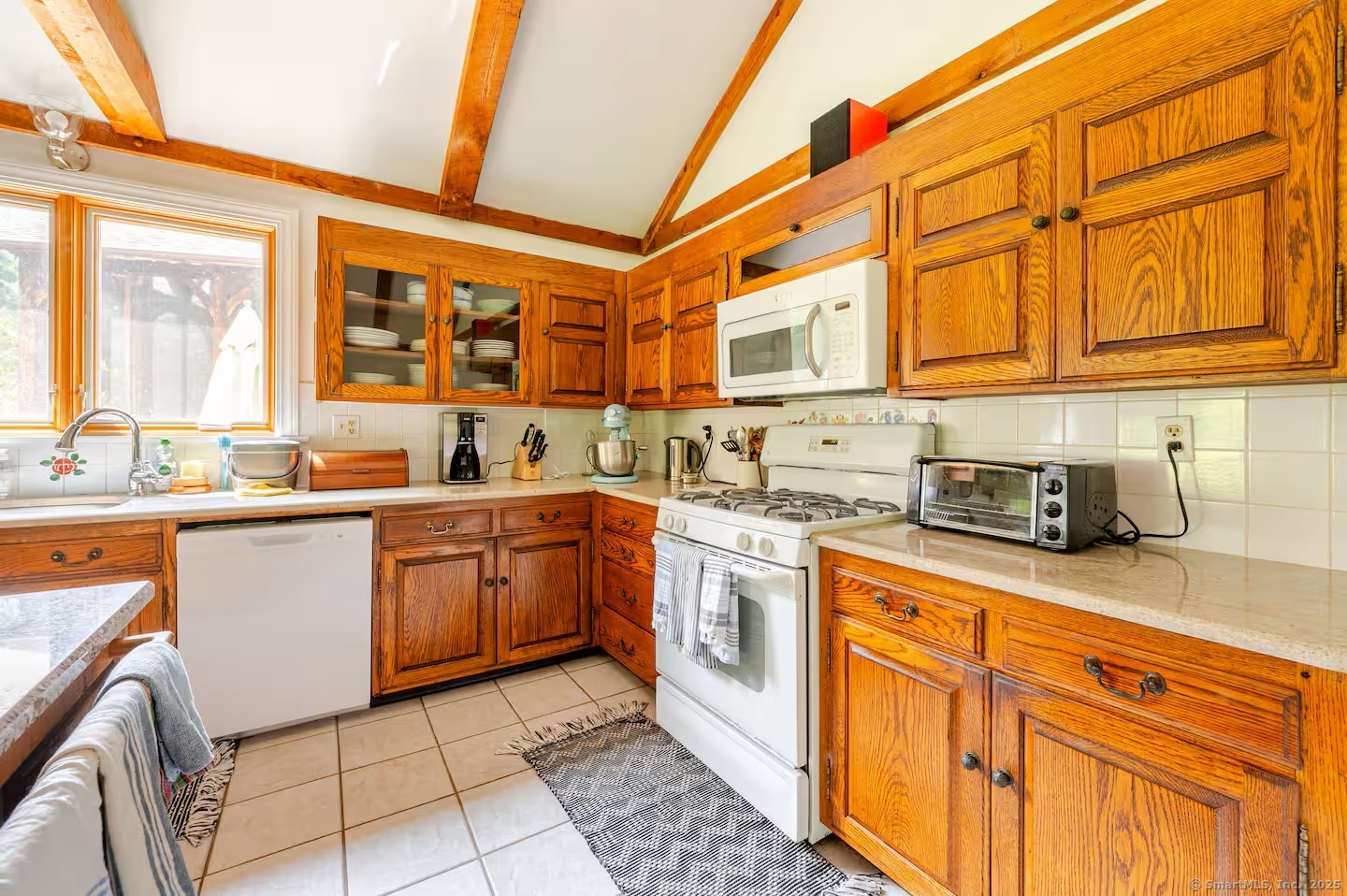 31 Cedar Hill Road New Milford, CT 06755 - Photo 8 of 40 a kitchen with stainless steel appliances granite countertop a sink and cabinets