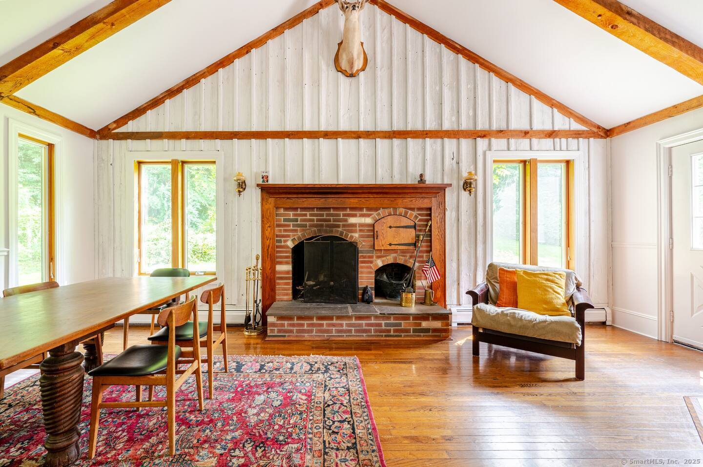31 Cedar Hill Road New Milford, CT 06755 - Photo 9 of 40 a living room with furniture and a fireplace