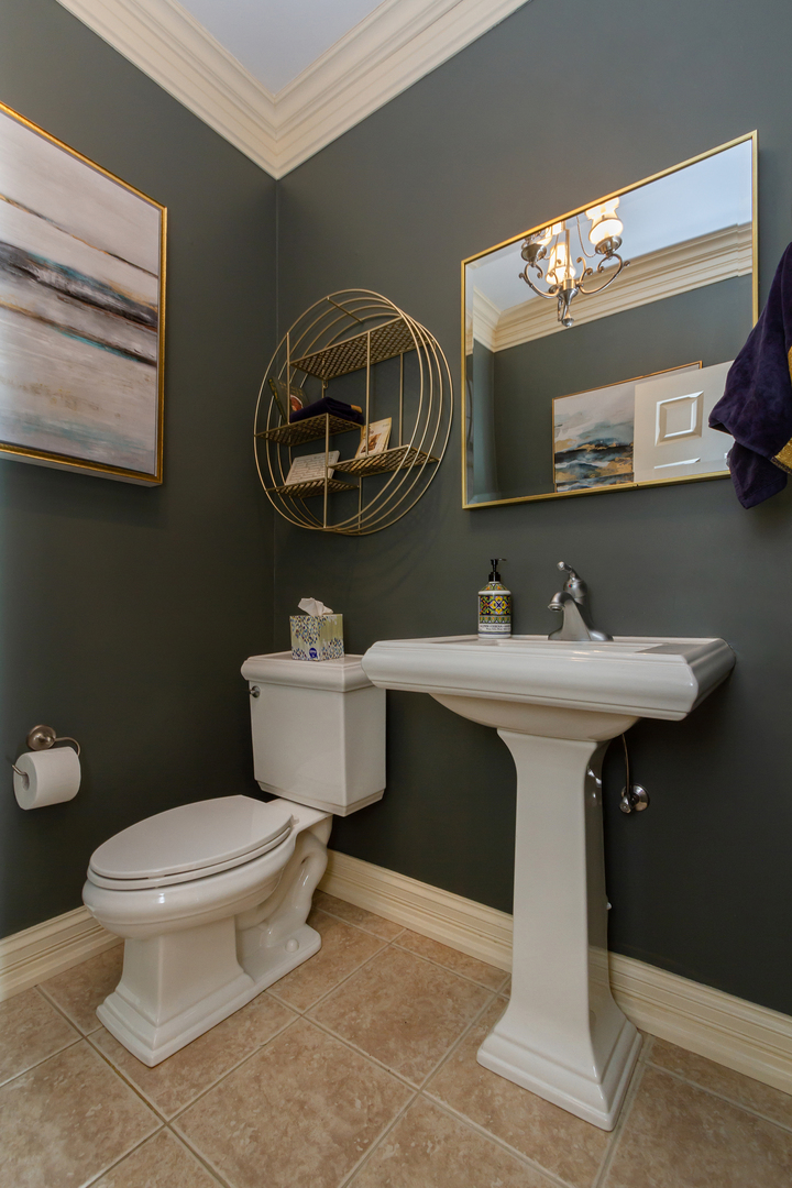 32 Bluestone Drive St. Charles, IL 60174 - Photo 17 of 33 a bathroom with a sink mirror and toilet