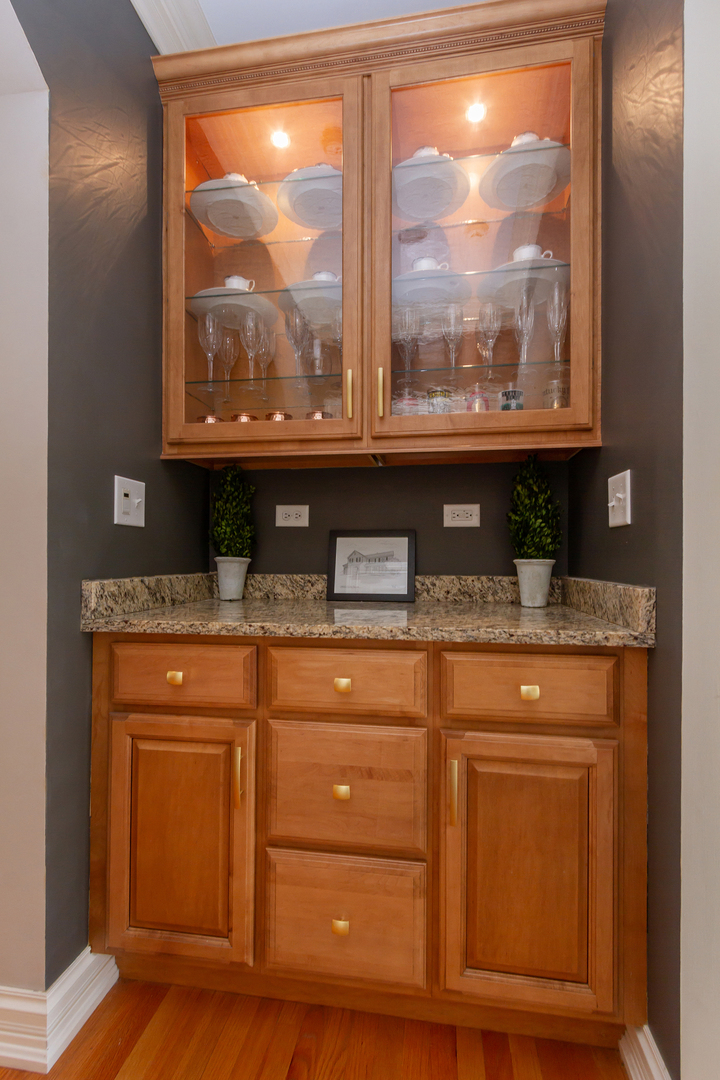 32 Bluestone Drive St. Charles, IL 60174 - Photo 9 of 33 a sink with a granite countertop window vanity and front view