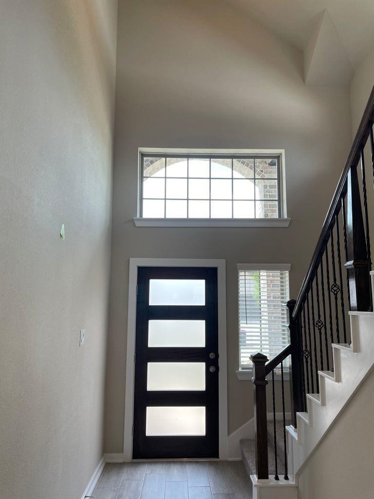 7912 Spring Run North Richland Hills, TX 76182 - Photo 9 of 21 a view of an entryway with staircase