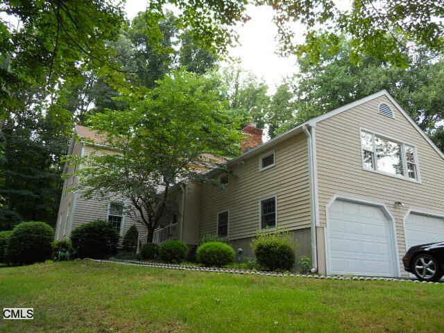 4 Spring Street Trumbull, CT 06611 - Photo 1 of 1 a view of a house with a yard