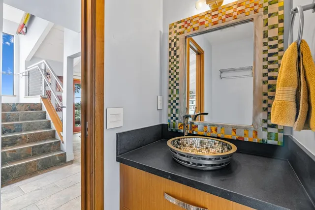 a view of a bathroom with a tub and sink